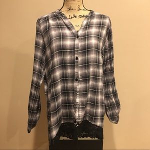 Plaid shirt with lace at the bottom